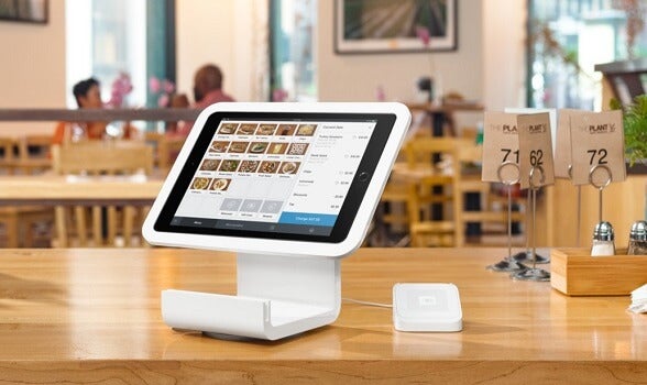square best restaurant pos on iPad with card reader